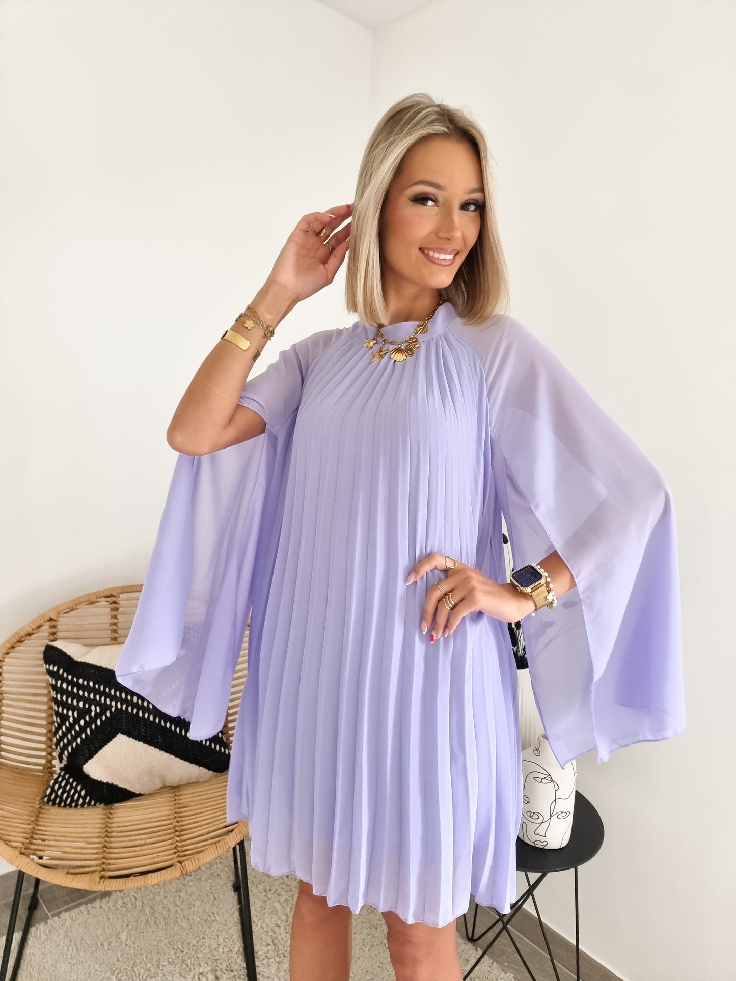 Robe cape plissée